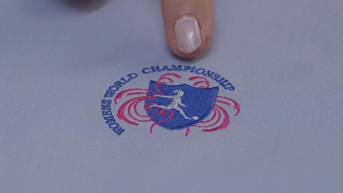 Finger showing a percect embroidery design without any fabric puckering
