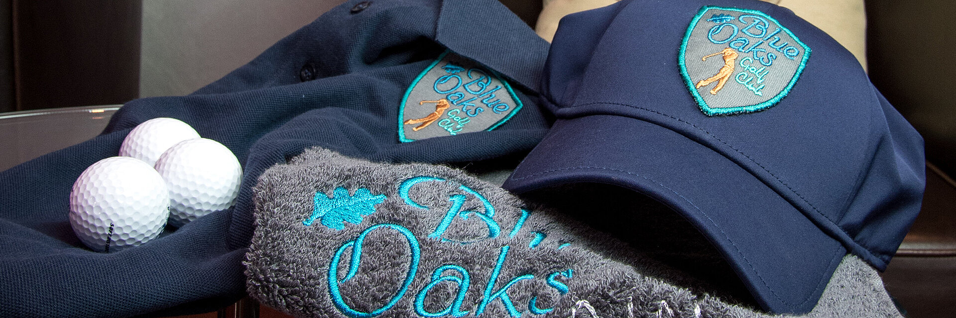Embroidered golf towel and cap