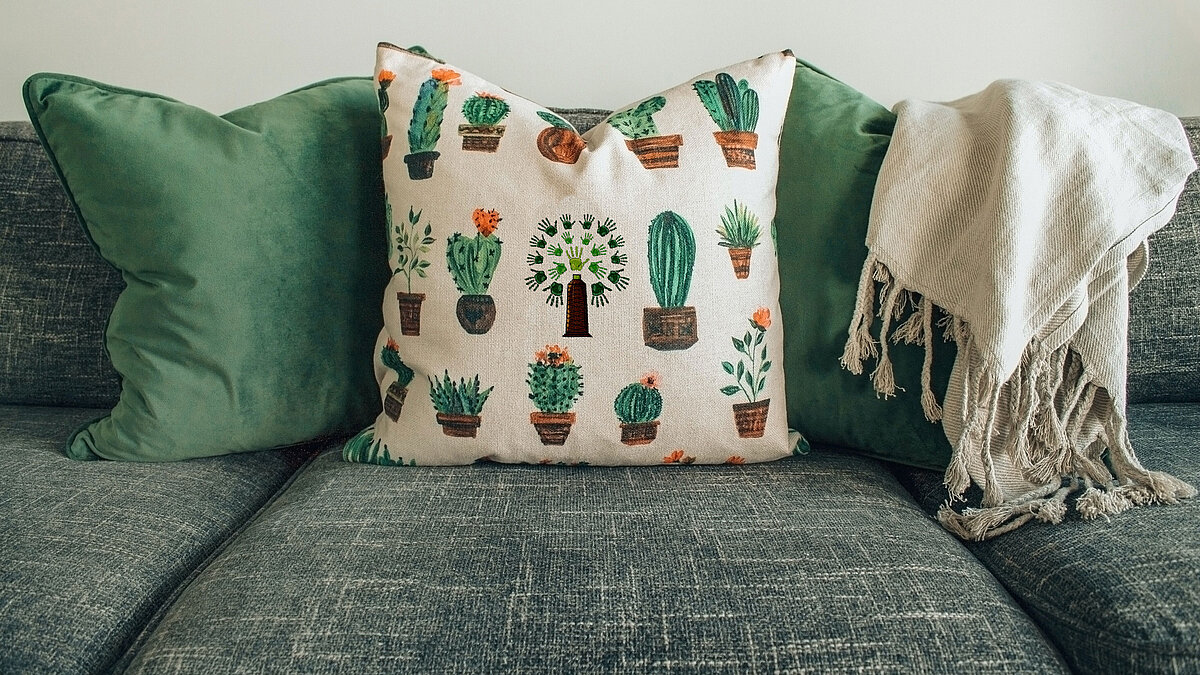 Green home decoration with cushion embroidered with lyocell threads Green home decoration with cushion embroidered with lyocell threads