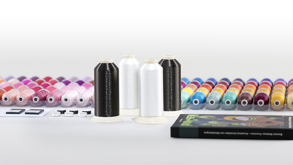 selection of embroidery underthreads and top threadsead