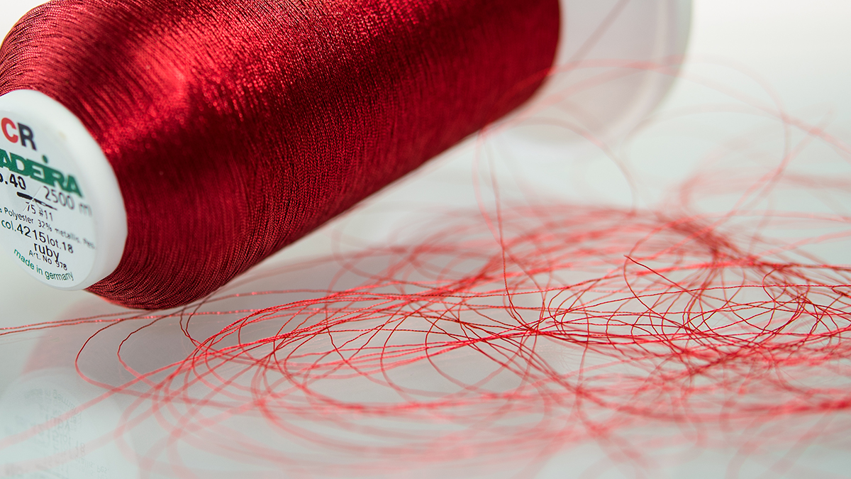 red metallic embroidery thread cone - CR Metallic