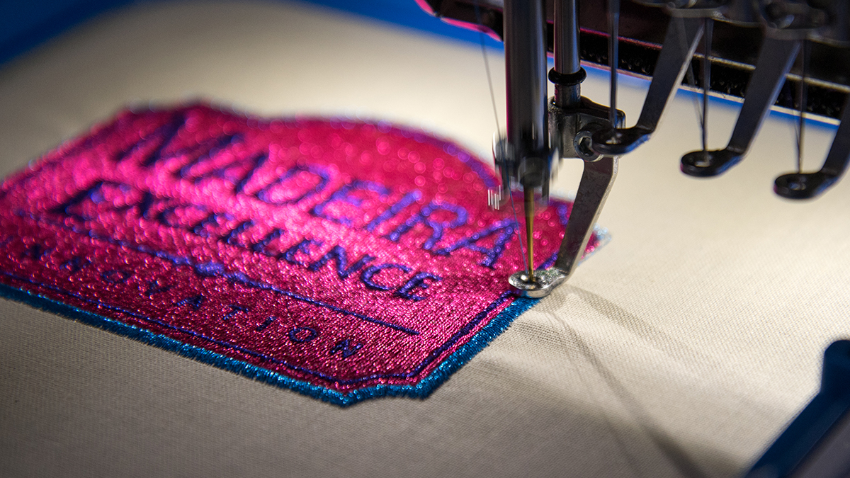 pink metallic embroidery design on machine